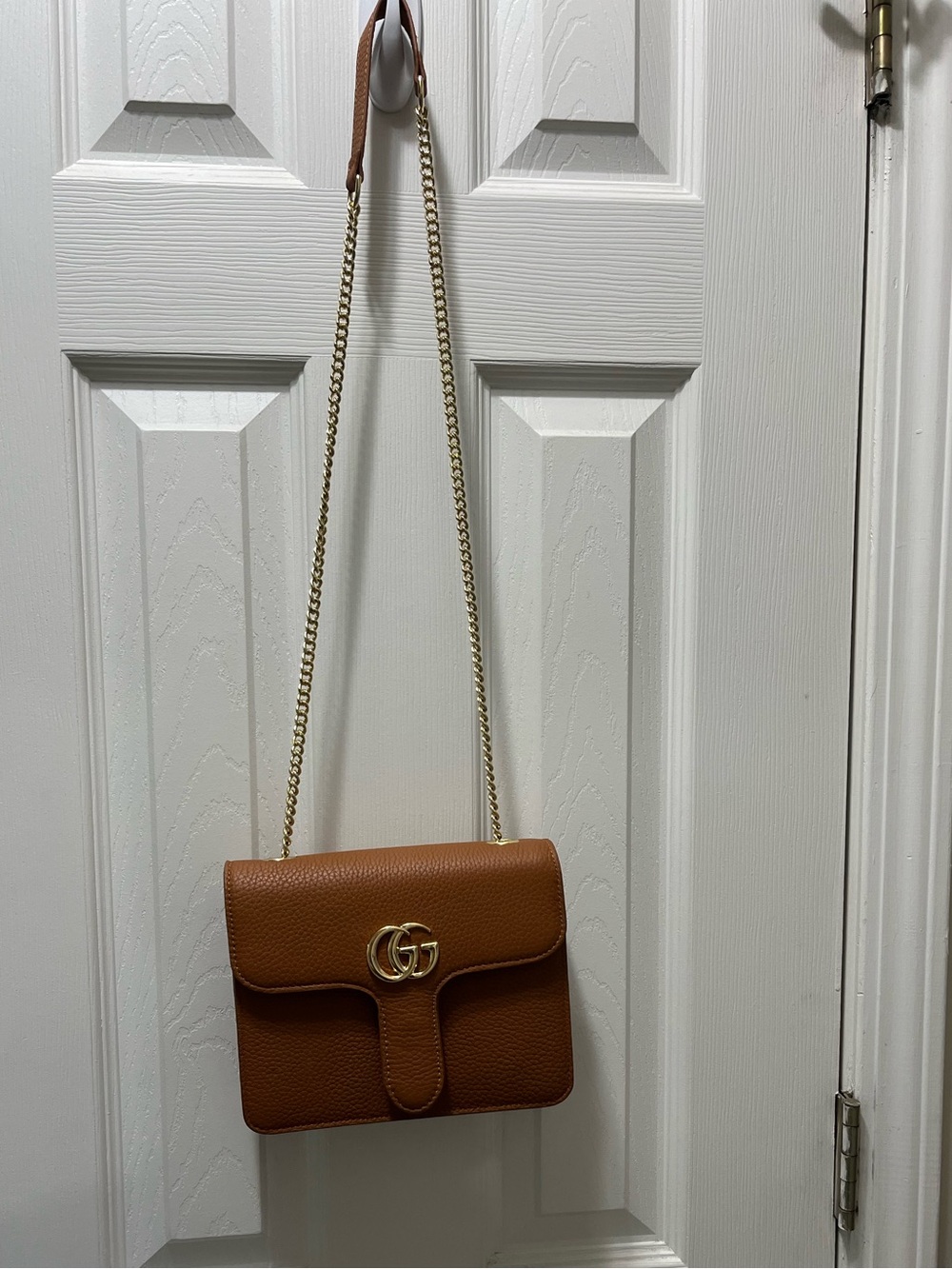 Imitation Gucci Tan Leather Crossbody with Gold Double G. Brand new w dust bag